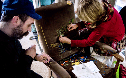 People stitching at C159