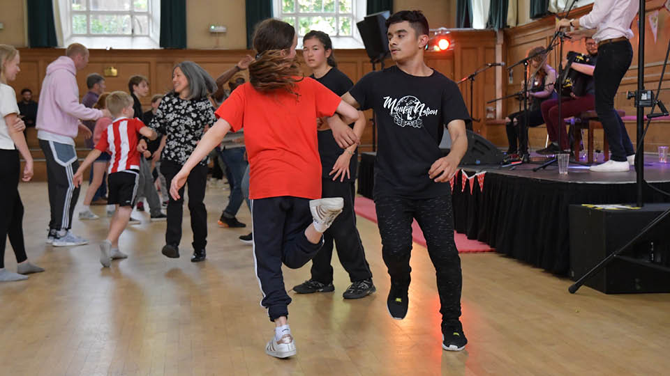 teenagers in energetic dancing