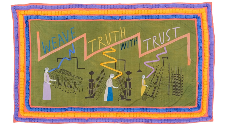 silk material with words 'Weave Truth with Trust' and images of female workers