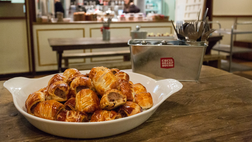 sausage rolls on table in cafe